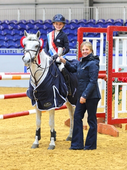 Chloe Capper & Dooneens Electric win the Scottish Branch 128 Indoor Championship at Scottish Horse of the Year Show 2026